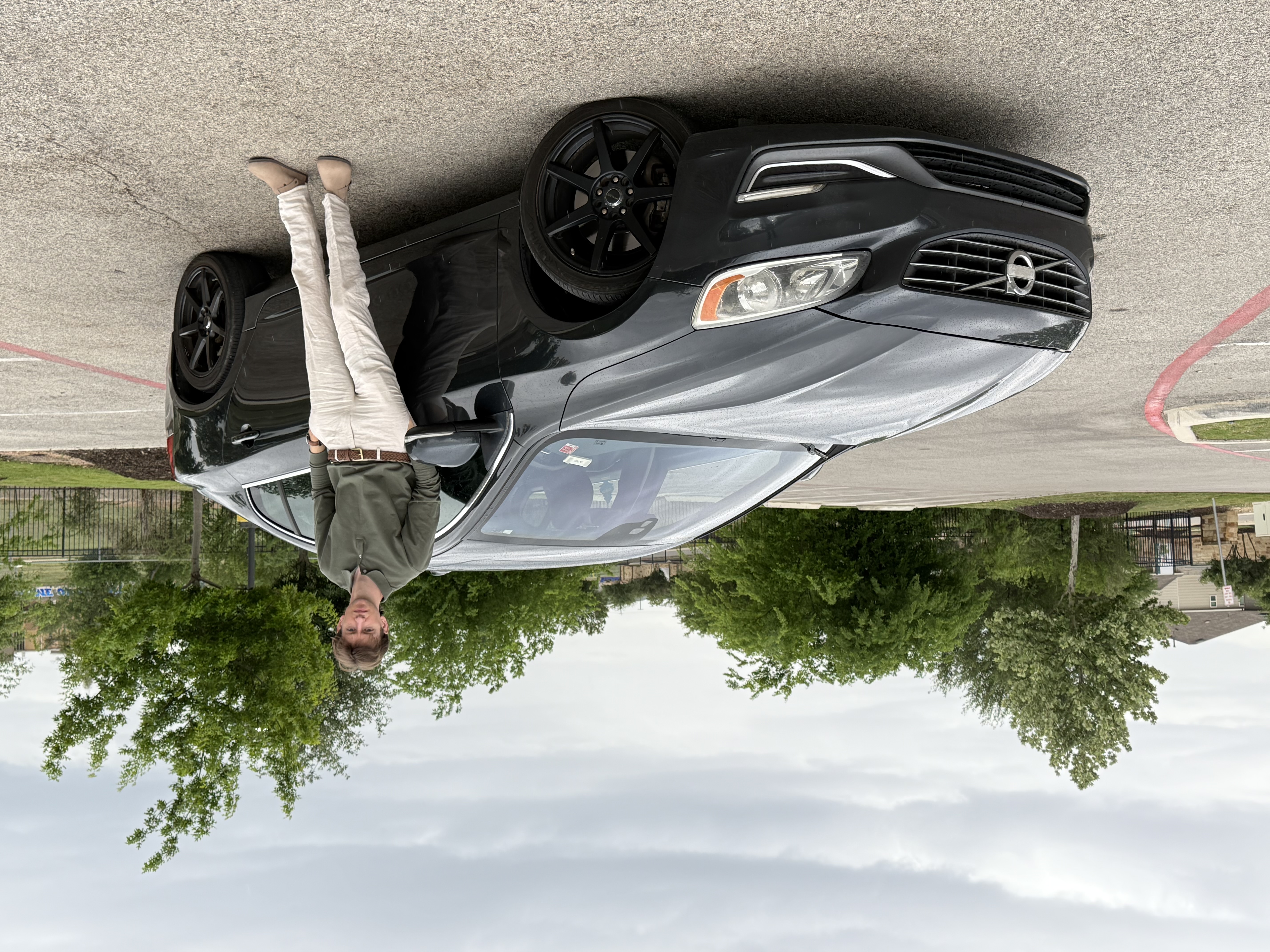 Danyon, founder of Drivertise USA, with his Volvo S60